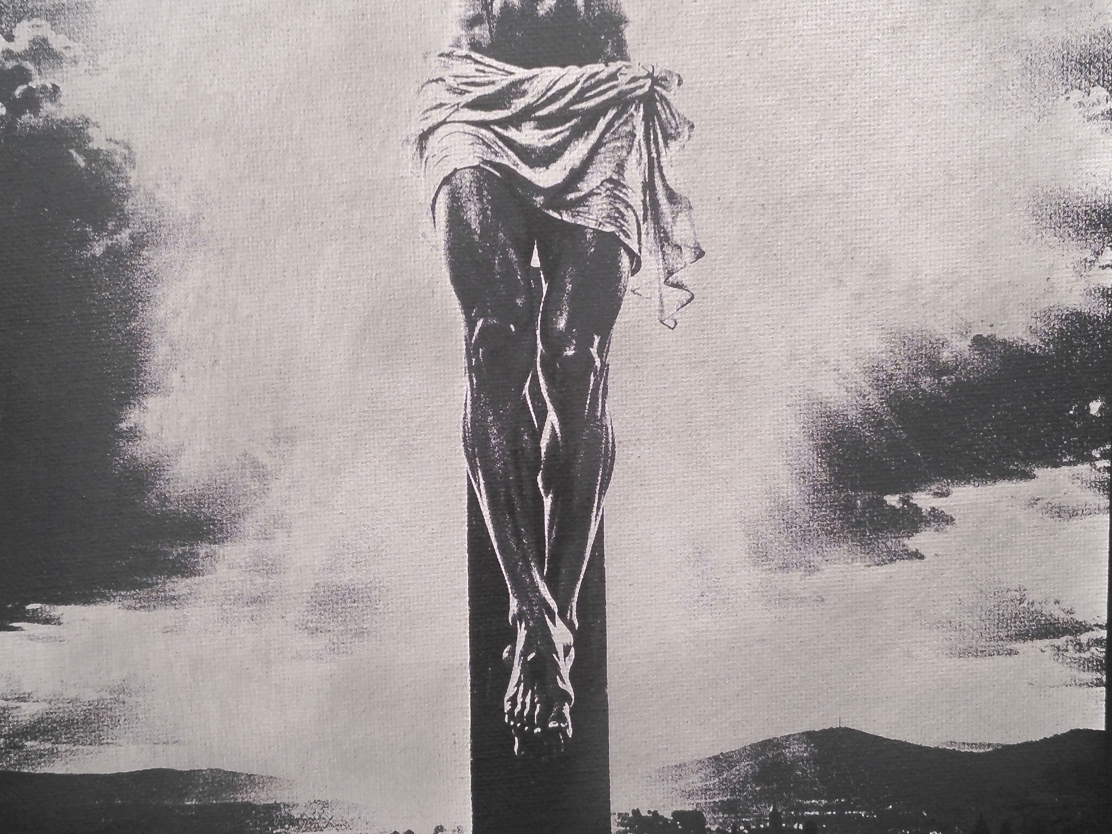 Laser-engraved, spray painted canvas board of Jesus Christ.