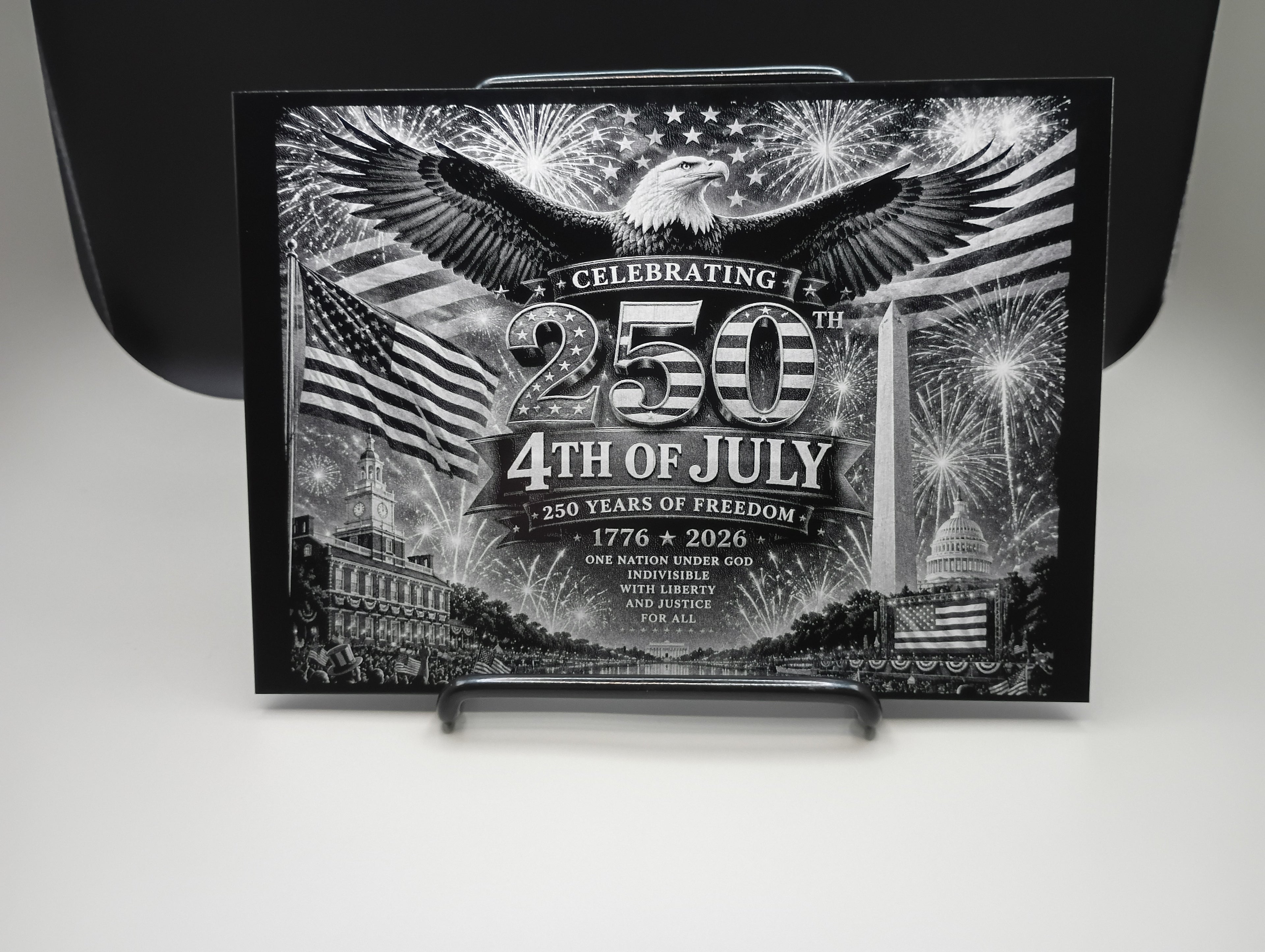 Decorative box celebrating the 250th anniversary of the 4th of July with an eagle, American flag, and fireworks.