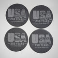Four black coasters with 'USA 250 Years 1776-2026' text on a white background